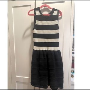 Girls Juicy Couture knit black&white dress. Beautiful back zipper accent Size XL